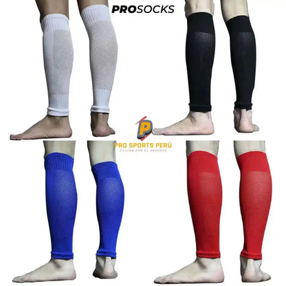 Cuatro vistas de medias precortadas sin pie ProSocks exhibidas en colores blanco, negro, azul y rojo para sujetar canilleras de fútbol.